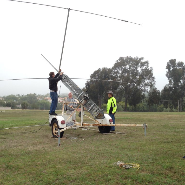 MD photo (184).jpg - Rocco securely fastens beam to antenna, with Walt Ordway K1DFO and Jim Laio KK6MNT.